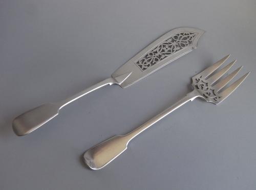 A very fine pair of Fish Servers made in London in 1861 by George Adams