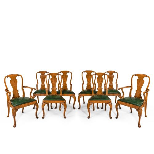 Set of eight Queen Anne style walnut and figured elm vase splat dining chairs
