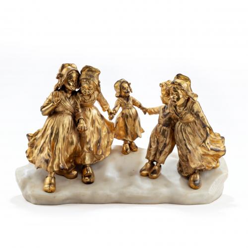 A charming gilt bronze group of Dutch children by Foste