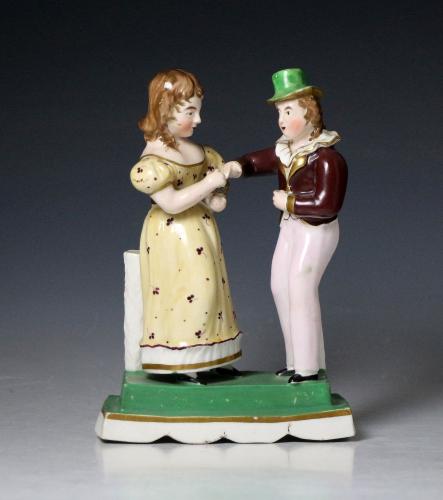 Staffordshire figure group of a boy and girl English circa 1835