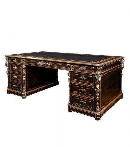 A large Napoleon III ebonized partners’ desk