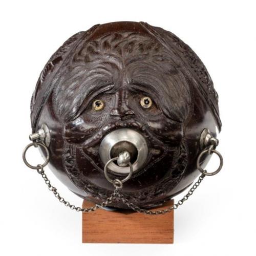 Coconut shell “bugbear” powder flask with silver mounts