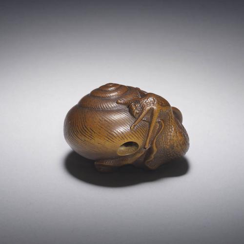 Boxwood netsuke of snail by Naito Toyomasa (1773-1856)