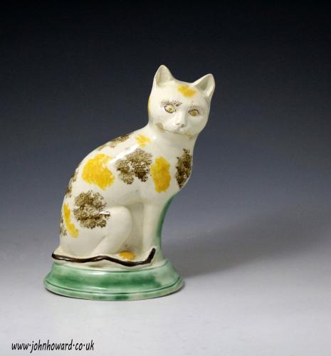 Antique English pottery figure of a seated cat with underglaze colours c1780 period, Staffordshire