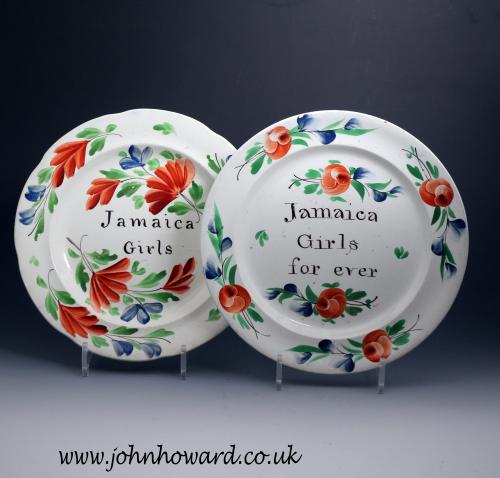 Pair of pottery pearlware glazed plates decorated in brilliant enamels with inscription  Jamaica Girls for ever