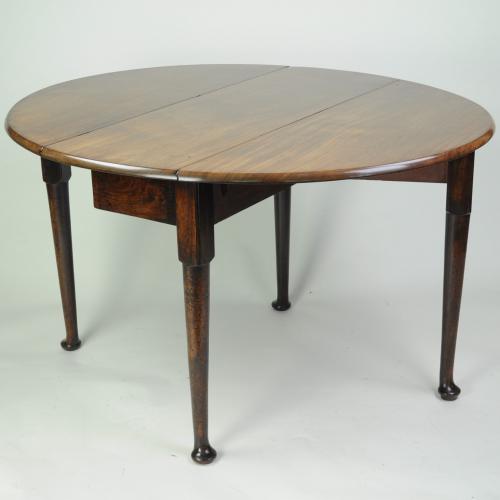 mahogany oval drop leaf dining table
