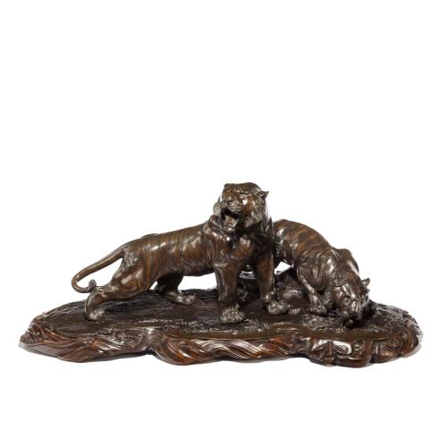A fine and large Meiji period bronze of two tigers by Genryusai Seiya