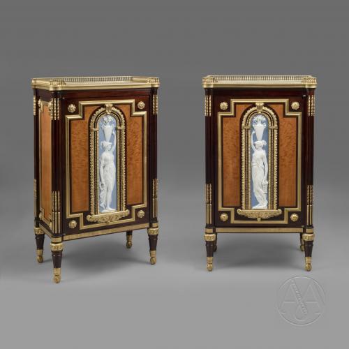 A Rare and Highly Important Pair of Neoclassical Style Gilt-Bronze and  Biscuit Porcelain Mounted Mahogany Side Cabinets by Jules Piret