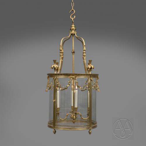 A Large Louis XVI Style Gilt-Bronze Cylindrical Four-Light Lantern