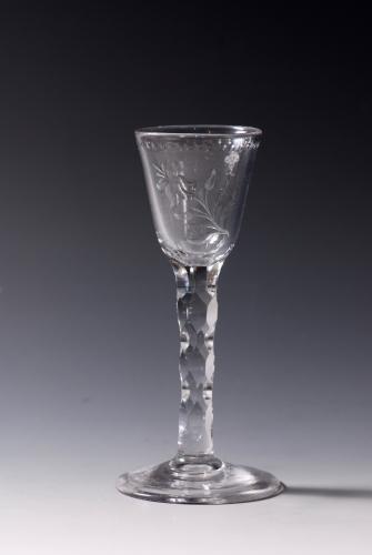 A facet stem wineglass