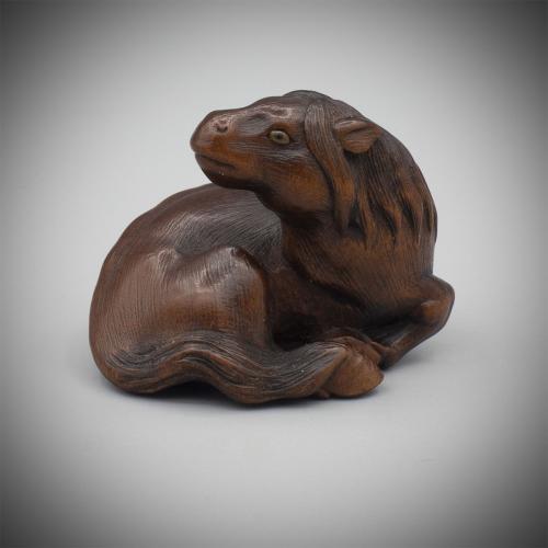 Exceptional Boxwood Netsuke of a Recumbent Mare by Ikkan