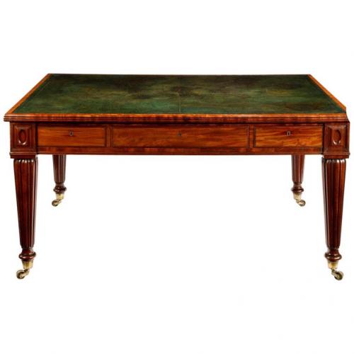 A Regency well-figured mahogany writing table