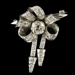 Platinum set diamond bow brooch