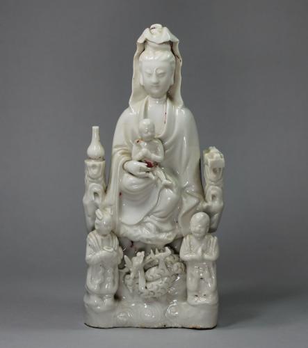 Chinese blanc de chine figure of a Guanyin and child, 17th century, (Kangxi)