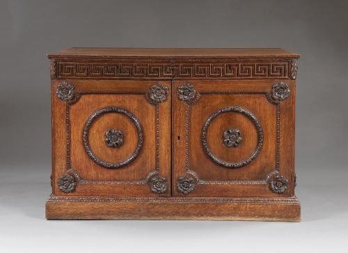 An Oak Two Door Folio Cabinet With Carved Kentian Detailing Probably Made For Stanwick Park