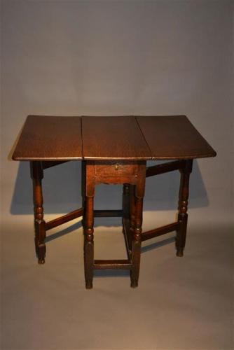 A Very Small Queen Anne oak gateleg table