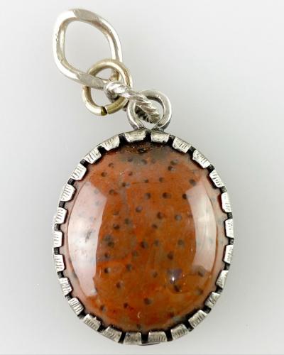 Spotted jasper IHS amulet. German, late 17th century