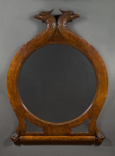 A Large Very Finely Carved Circular Oak Mirror Surmounted By Addorsed Eagle Heads With Talon Feet Clasping A Scroll