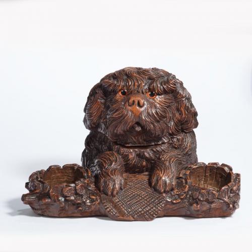  A ‘Black Forest’ walnut tobacco box in the form of a long-haired dog
