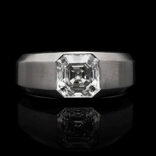 A striking 2.01ct diamond and brushed platinum geometric gypsy-set ring with bevelled edges