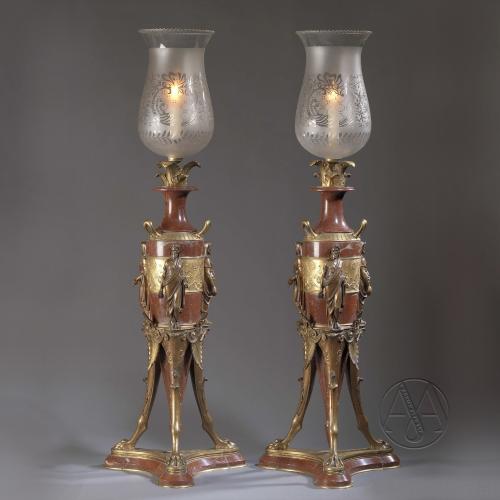 An Unusual Pair of Rouge Marble Candelabra by Georges Servant
