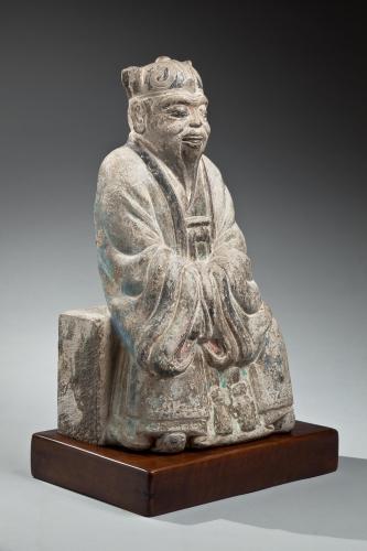 A carved grey stone figure of the deified Laozi, Chinese, Ming dynasty, probably 16th century.
