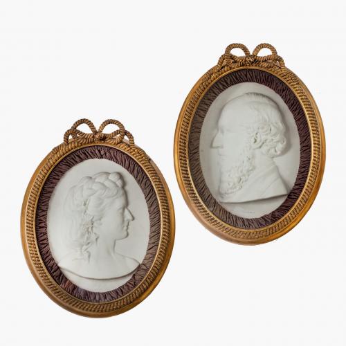 A pair of Victorian marble portrait plaques