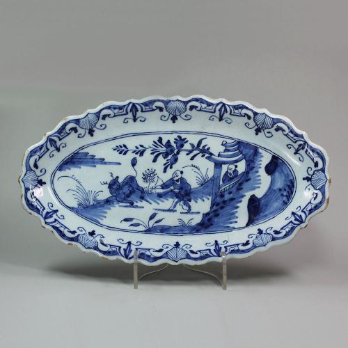 Dutch Delft blue and white scalloped oval saucer