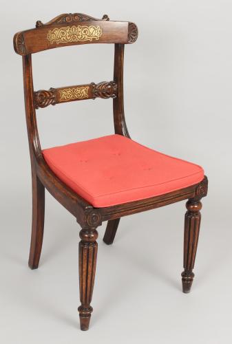 Set of eight Regency period simulated rosewood and brass inlaid chairs
