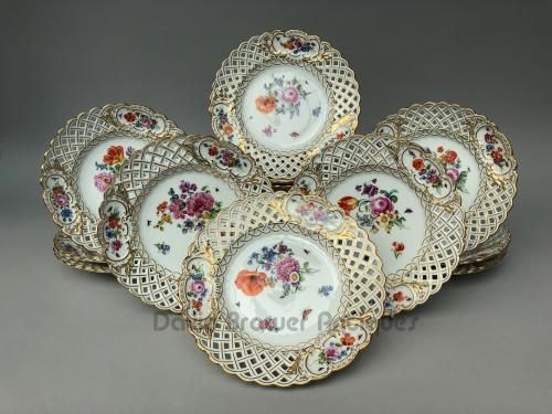 set of 12 German Meissen porcelain plates, reticulated borders and finely painted flowers