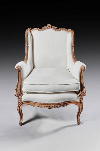 Carved 19th Century French Louis XV Style Wing Armchair