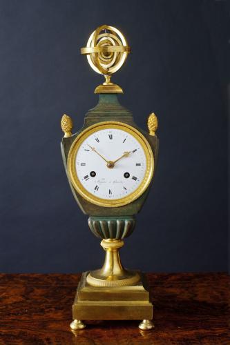 French Empire Patinated Bronze and Ormolu Mantel Clock