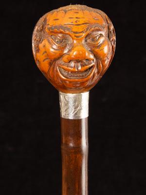 Coquilla nut-handled cane carved as a man's head_a