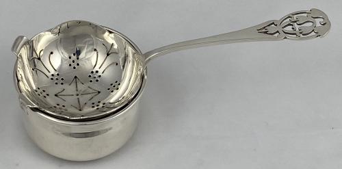 Gee and Holmes silver tea strainer and stand 