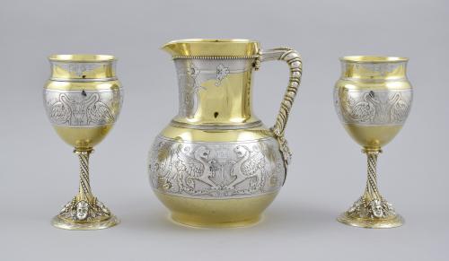 Parcel-gilt sterling silver ewer and pair of goblets