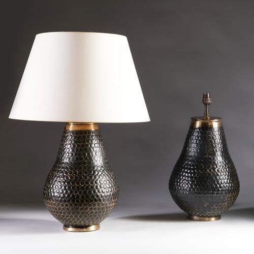 A Pair of Punched Metal Lamps with Brass Rims