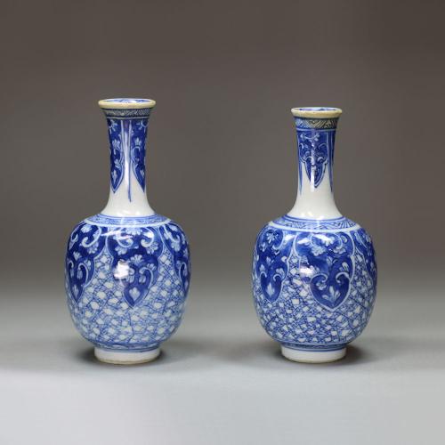 Pair of miniature Chinese blue and white bottle vases, Kangxi (1662-1722)