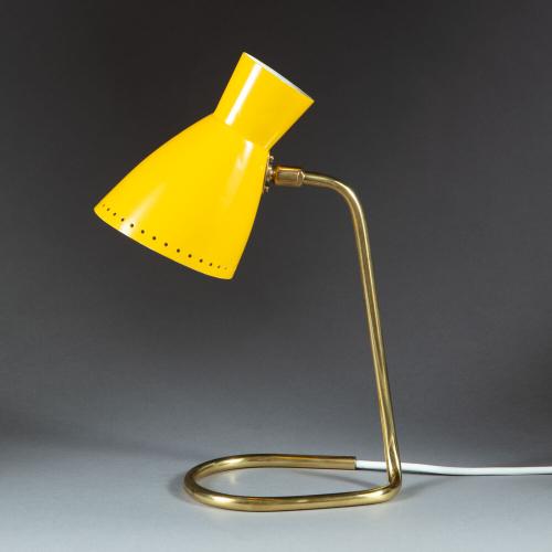 A Tubular Brass Desk Lamp with Yellow Shade