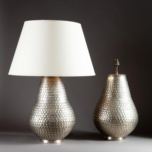 A Pair of Silvered Punched Metal Lamps