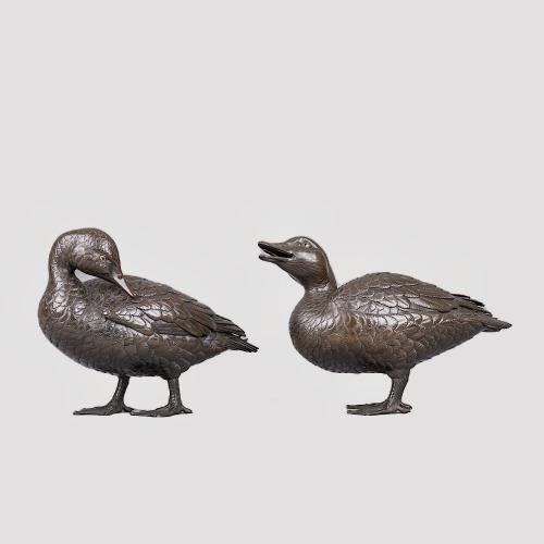 Japanese pair of bronze ducks signed Takachika, Meiji Period.