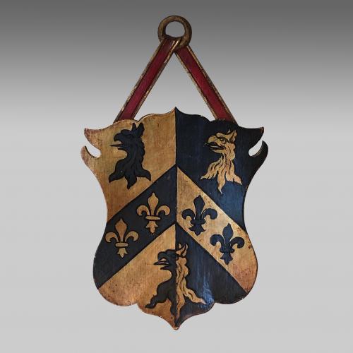 Vintage armorial oak shield for Trinity College, Oxford.