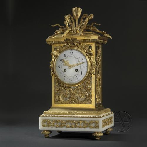 Gilt-Bronze Clock With A White Marble Base by François Linke