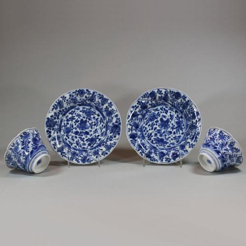 Pair of Chinese blue and white moulded teabowls and saucers, Kangxi (1662-1722)