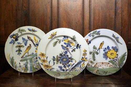 Bristol delftware pottery chargers with birds, flowers and insects 18th century England