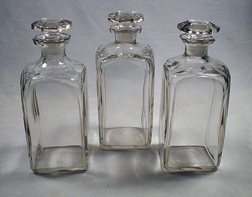 set of three heavy crystal glass square section spirit decanters