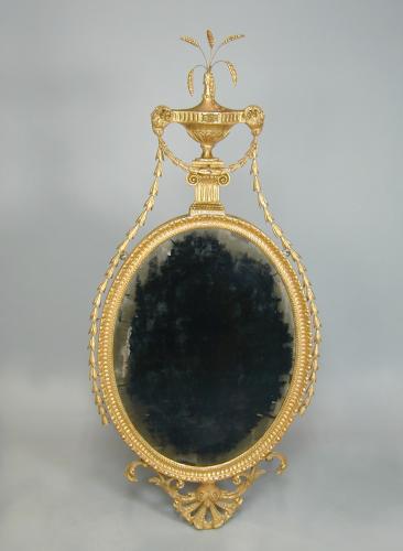 Adam period oval giltwood mirror with original plate and gilding, c.1780