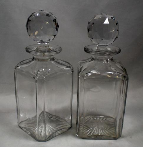 A pair of heavy square section crystal glass spirit decanters English c.1880