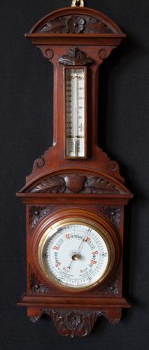 Late 19th Century carved mahogany Aneroid Barometer / Thermometer in original condition. c 1890