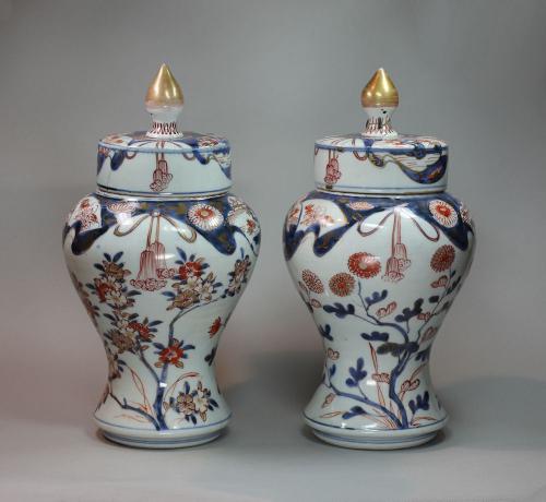 Pair of Japanese imari baluster vases and covers, circa 1700