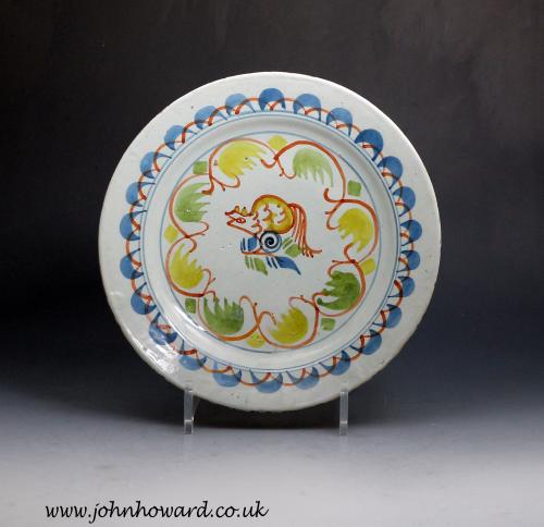English delftware plate polychrome decorated with image of a squirrel made in London circa 1730